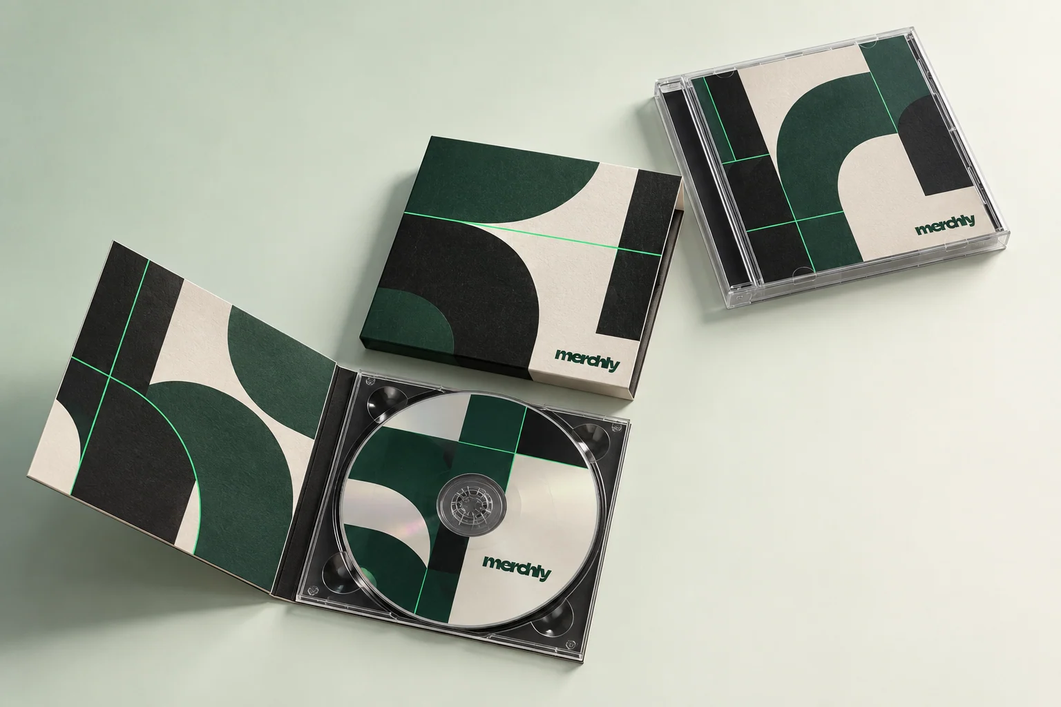 Digipack ouvert, digisleeve carton et boîtier cristal Merchly réunis dans une collection graphique noire, ivoire et verte.
